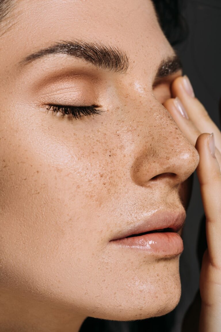 a close up on a woman with freckles