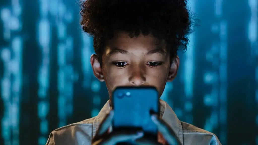 a teenager using a smartphone